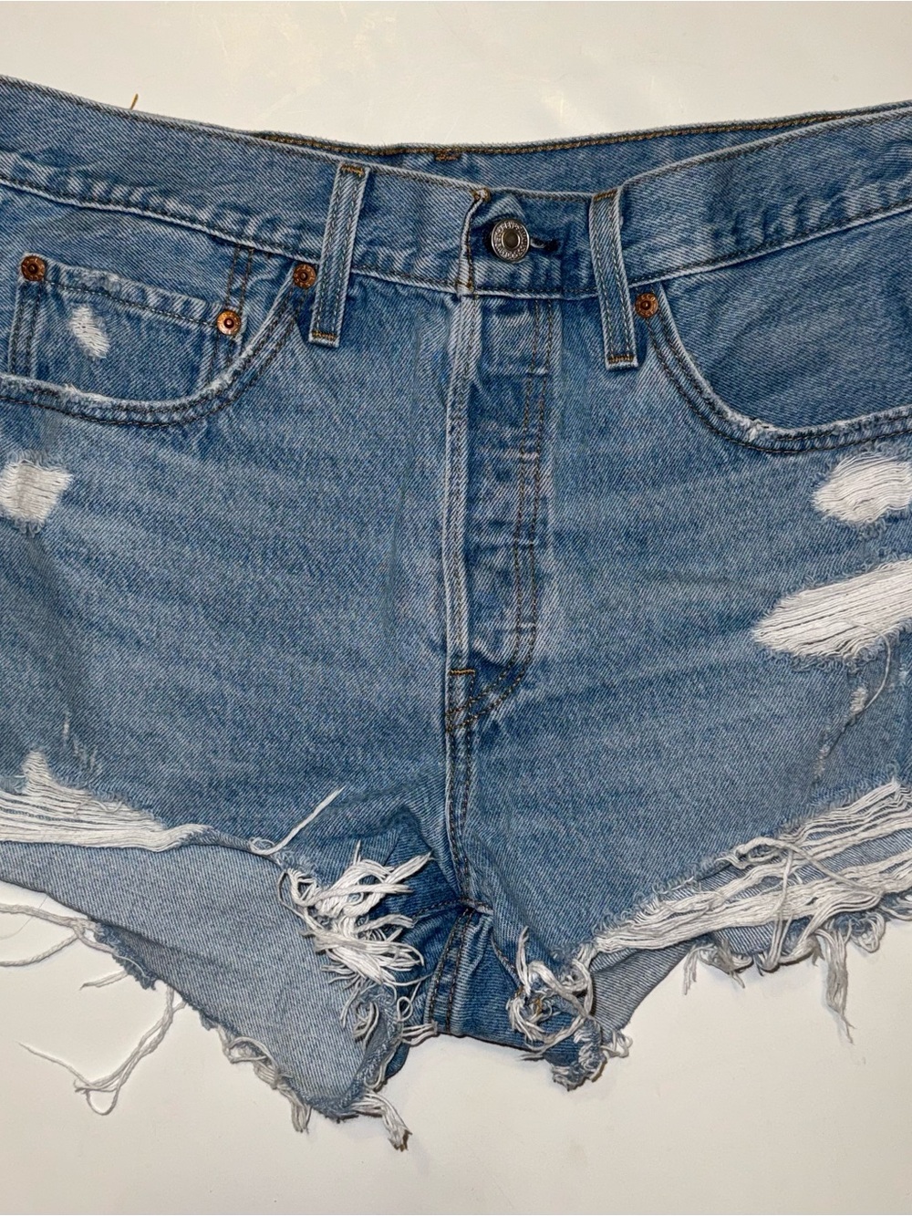Levi’s 501 Distressed Blue Denim Shorts